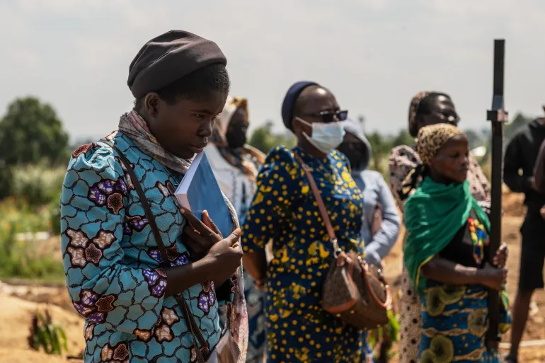 Catholic nuns attend the funeral of an infant who died of Ebola in Bunia, eastern DR Congo. Photo: Al Jazeera