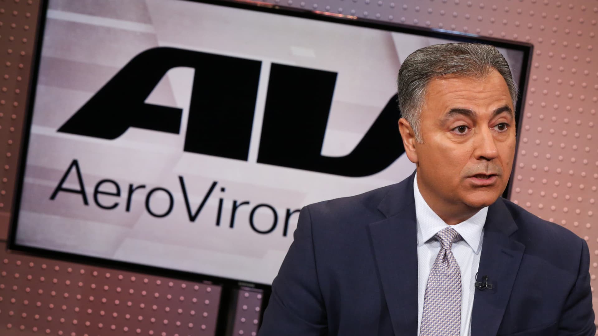 AeroVironment logo and Titan RF counter-drone system as defense stock rallies. Photo: CNBC