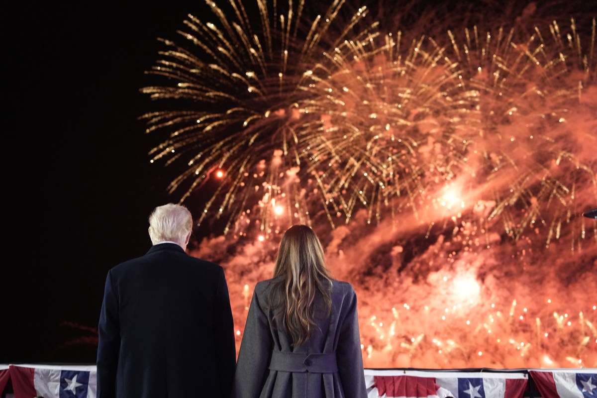 Massive fireworks display bursting over the National Mall and Washington Monument on the Fourth of July