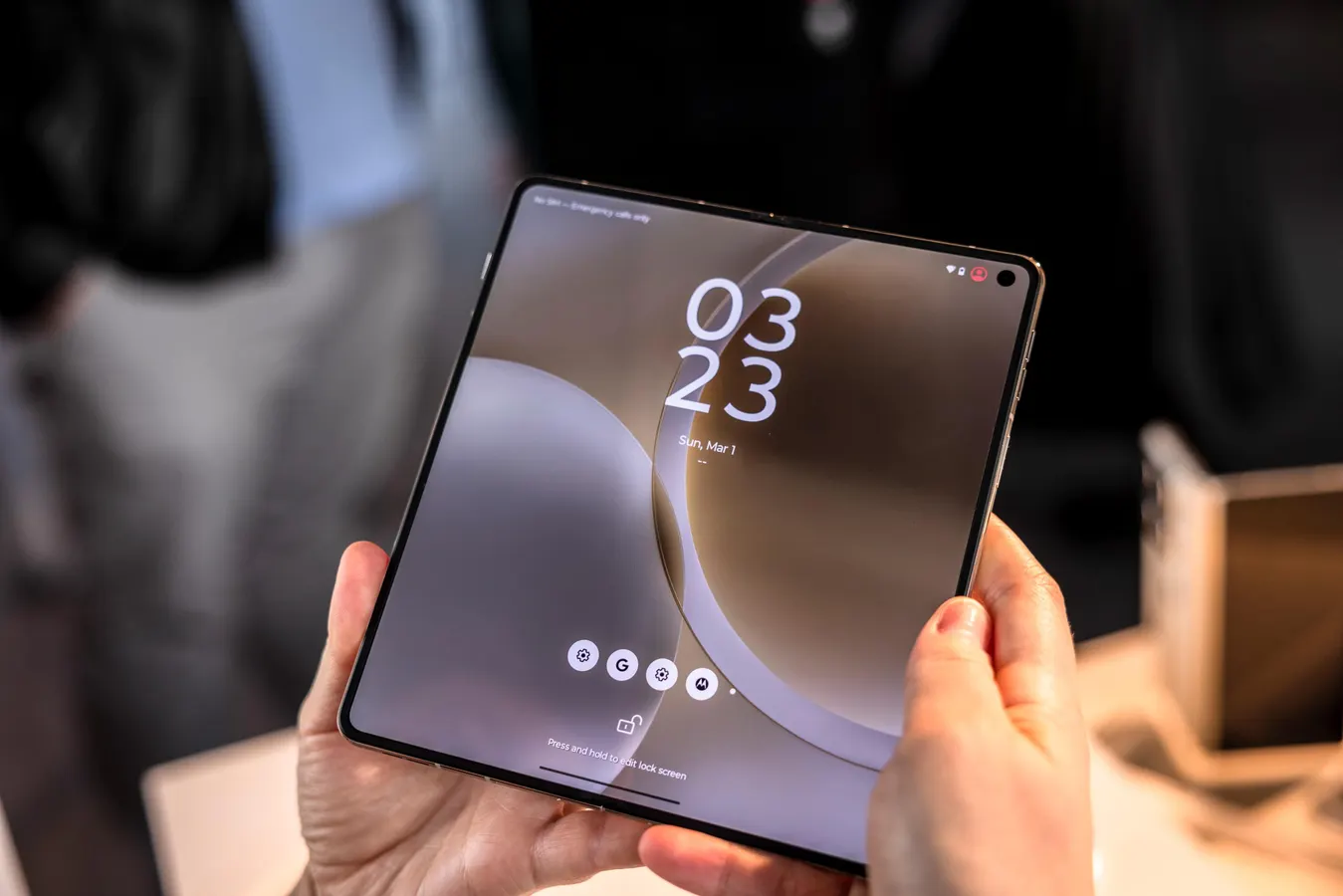 Apple foldable iPhone Ultra concept beside rising share price chart. Photo: Forbes