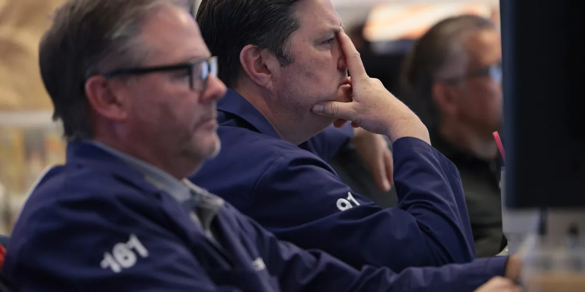 The New York Stock Exchange facade as investors weigh stretched valuations against a softening labor market. Photo: Fortune