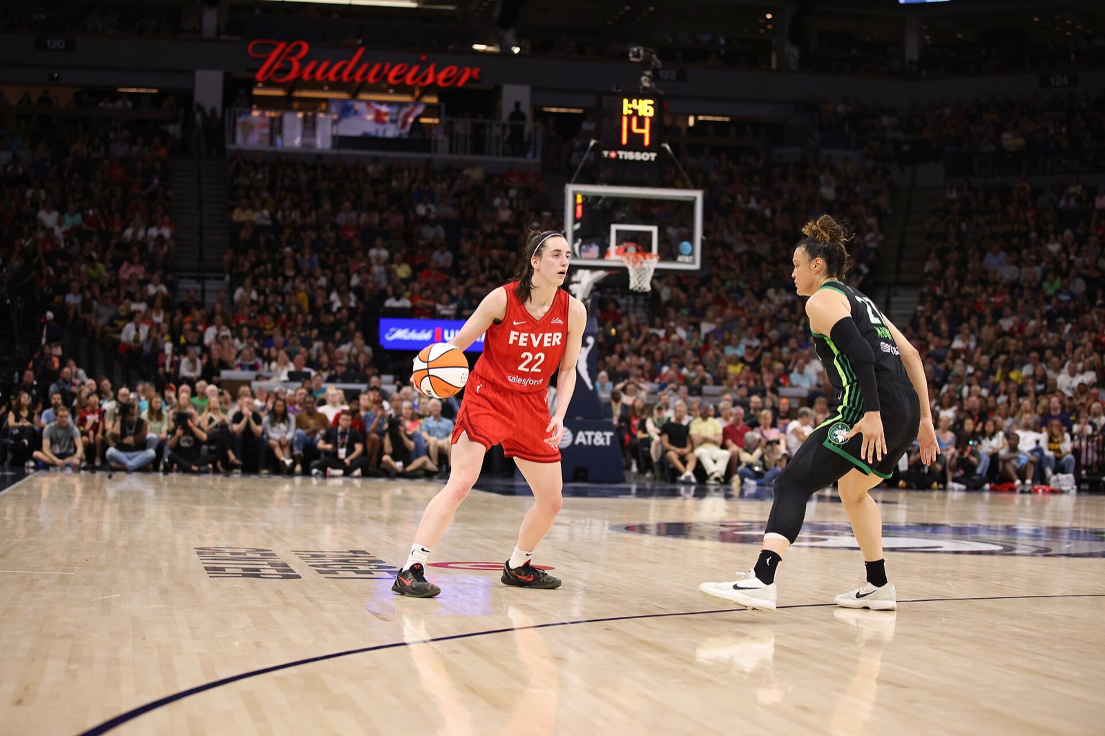 Caitlin Clark of the Indiana Fever on the court during a WNBA game. Photo: John Mac / Wikimedia Commons, CC BY-SA 2.0