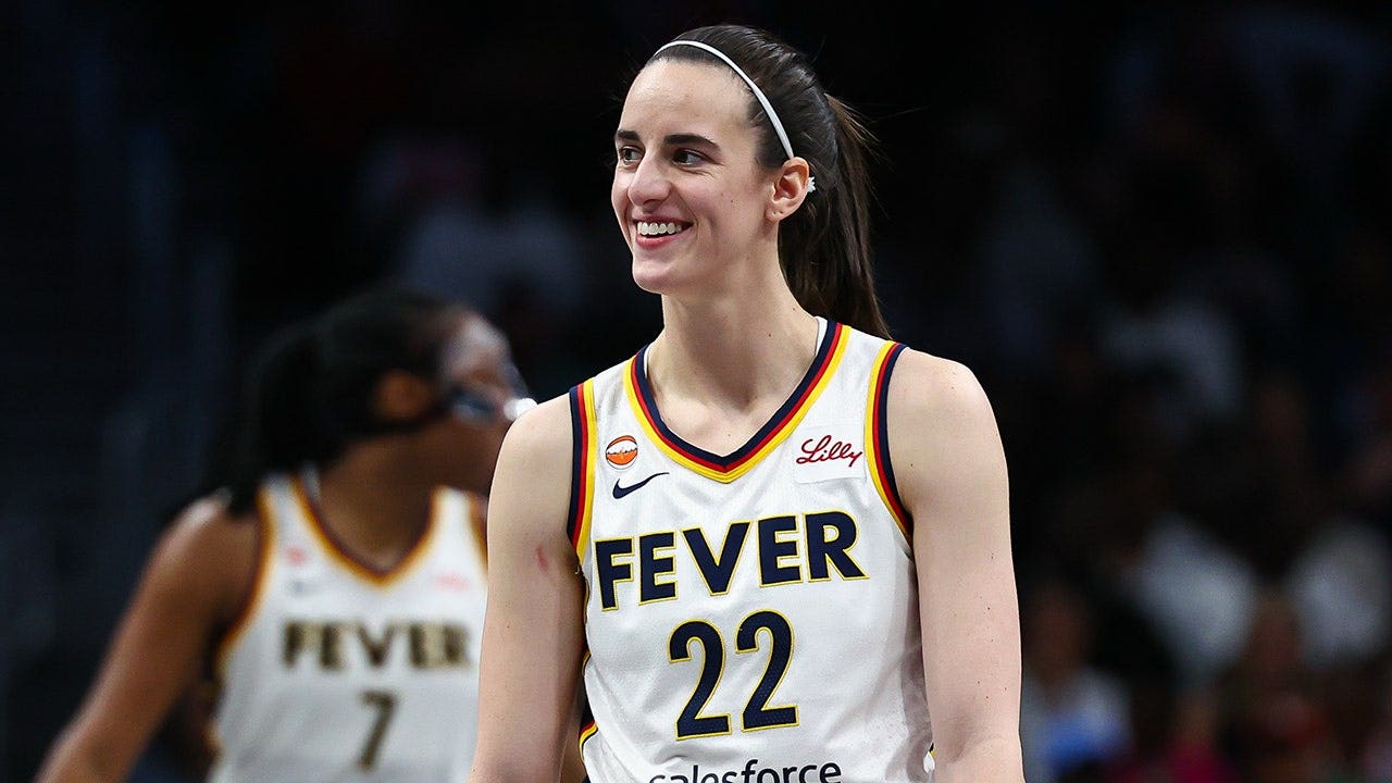 Indiana Fever guard Caitlin Clark bringing the ball upcourt in a WNBA game as she is named a 2026 All-Star starter