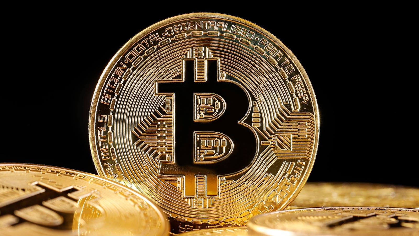 Bitcoin price chart on a trading screen showing a sharp decline alongside a Citigroup research report