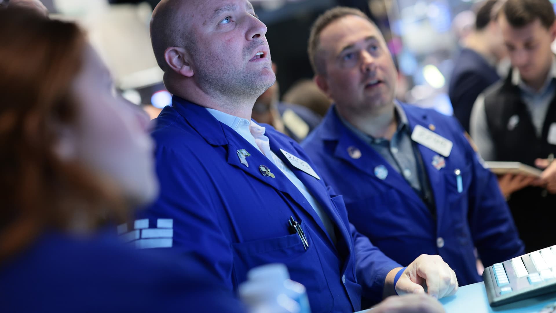A trader monitors screens on the floor of the New York Stock Exchange as the Dow sets a record. Photo: CNBC