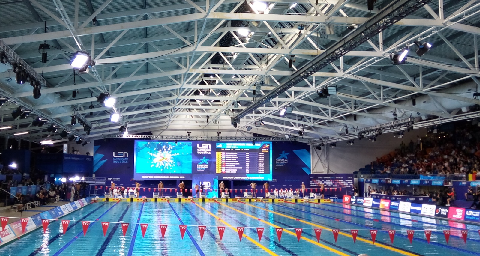 Exterior of Tollcross International Swimming Centre in Glasgow, the swimming venue for the 2026 Commonwealth Games. Photo: Daniel (Flickr) / Wikimedia Commons, CC BY 2.0.