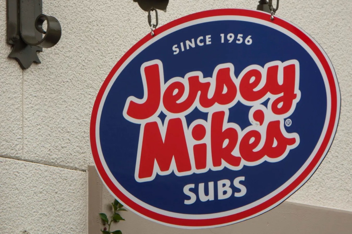 A Jersey Mike's Subs sign hangs outside a franchise location. Source: Forbes