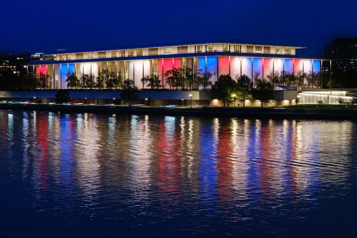 Rooftop terrace of the Kennedy Center in Washington D.C. set with reserved tables for a July 4 fireworks viewing event