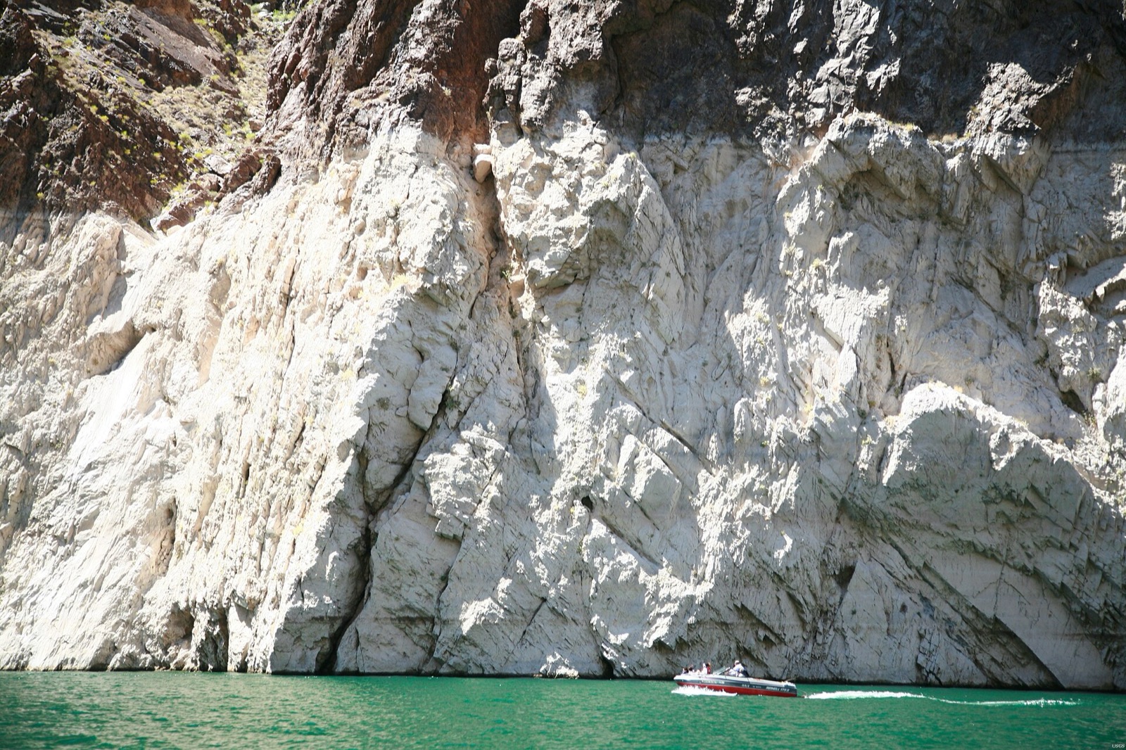 Exposed white mineral ring on the canyon walls of Lake Mead showing how far the reservoir has dropped. Photo: U.S. Geological Survey / Wikimedia Commons, Public domain