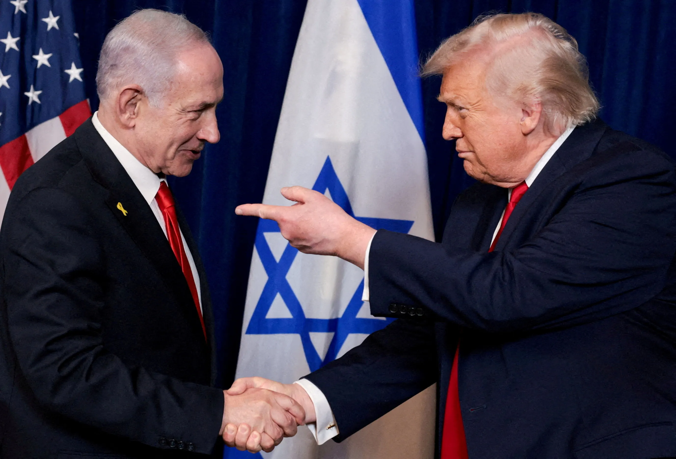 Israeli Prime Minister Benjamin Netanyahu speaks to reporters ahead of an expected White House visit. Photo: Al Jazeera