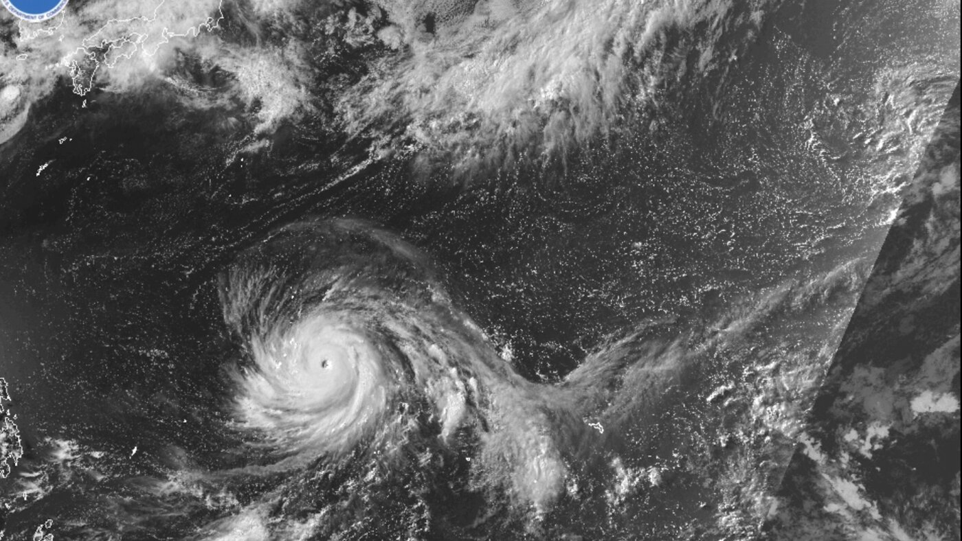 Storm-battered street and downed debris in the US Pacific territories as Super Typhoon Bavi makes landfall. Photo: NPR